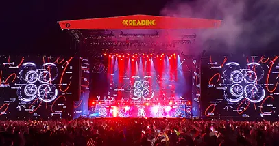 SSE & CO joined forces with Solotech Live productions stage with pink and purple lighting and video